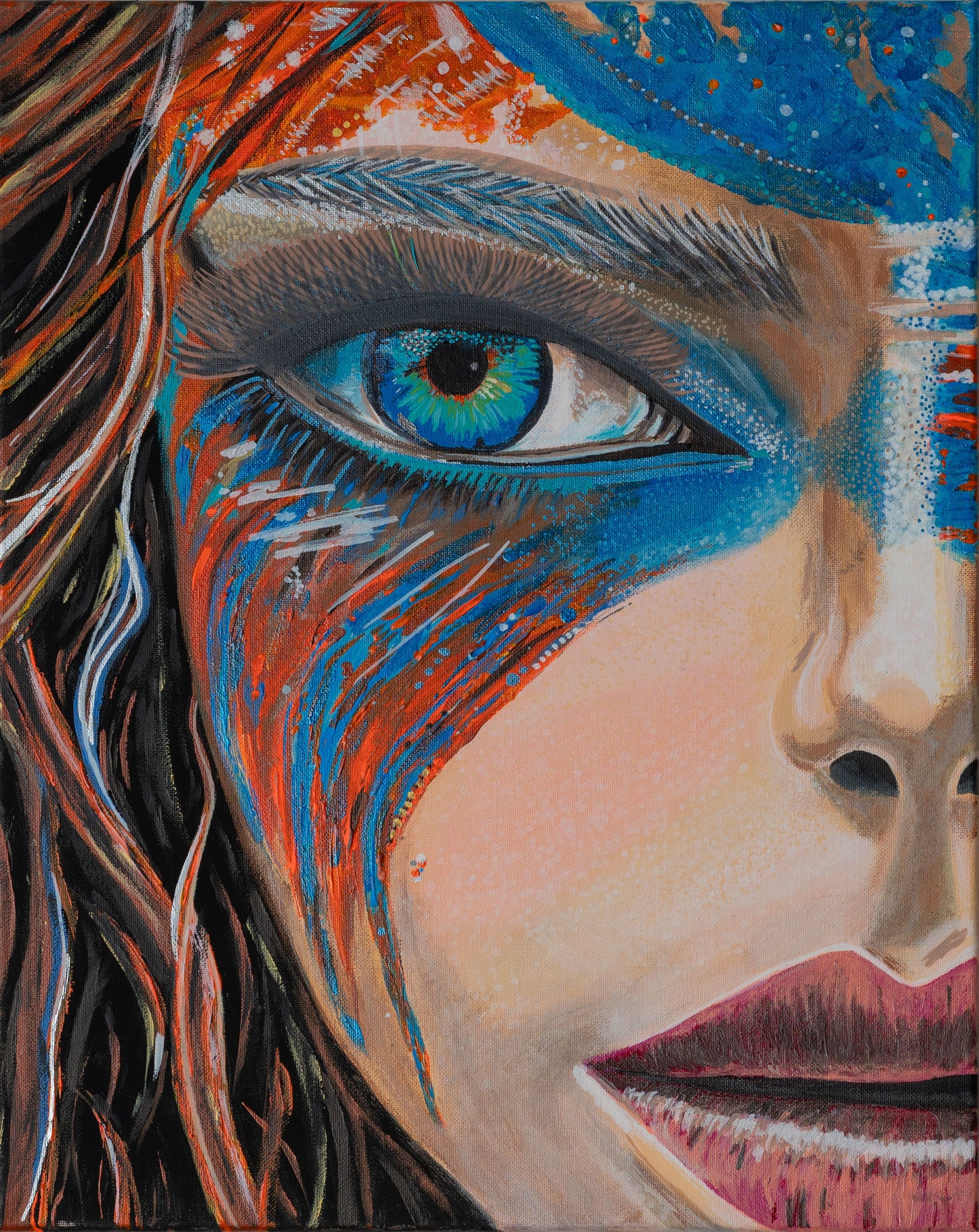 Close-up of a stylized face with blue eye and colorful patterns